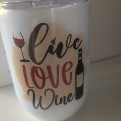 12 Oz stainless steel wine tumbler. It says live love love wine