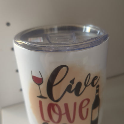 12 Oz stainless steel wine tumbler. It says live love love wine