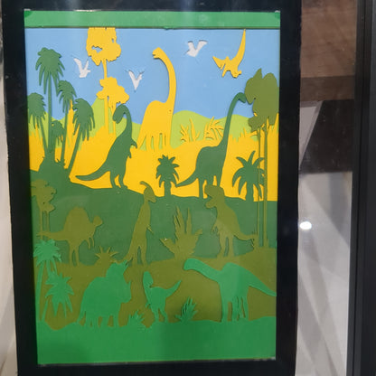 8 x 10” frame with 5 x 7" paper cut dinosaur scene