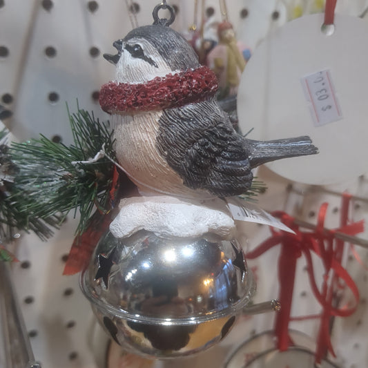 Bird on bell ornament