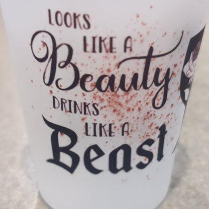 Glass shot glass.  Looks like a beauty drinks like a beast