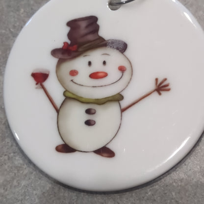 Ceramic ornament snowman with a wine glass