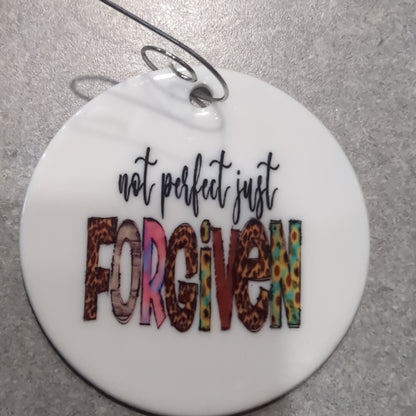 Ceramic ornament with The words not perfect just forgiven