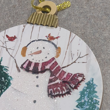 MDF ball ornament with a snowman