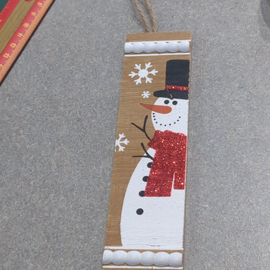 MDF ornament with a snowman