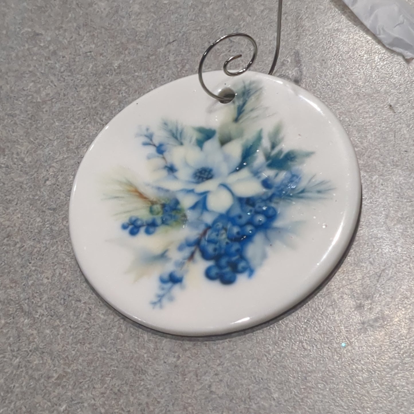 Ceramic ornament flowers and blue berries
