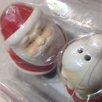 Salt and pepper shakers Santa and Mrs Claus