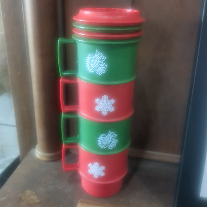 4 Tupperware holiday cups with saucers