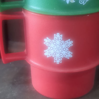 4 Tupperware holiday cups with saucers