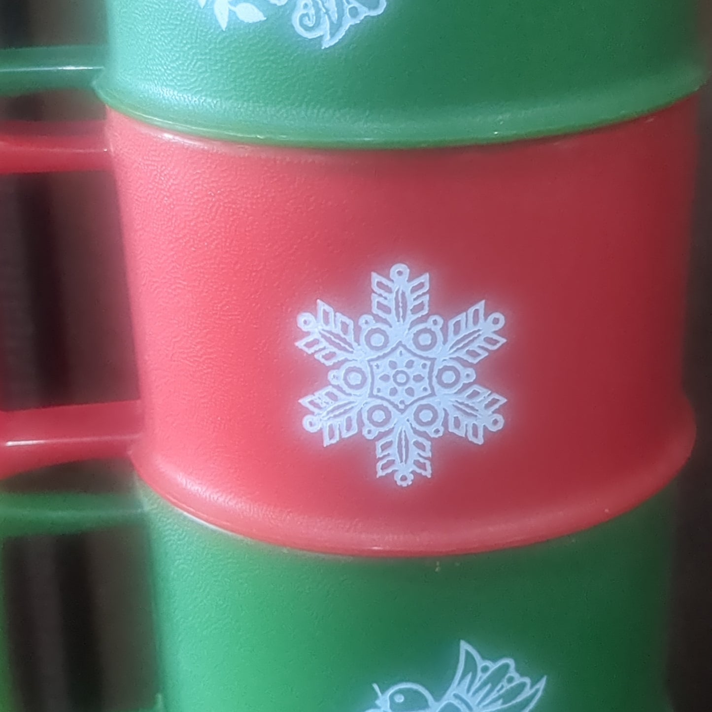 4 Tupperware holiday cups with saucers