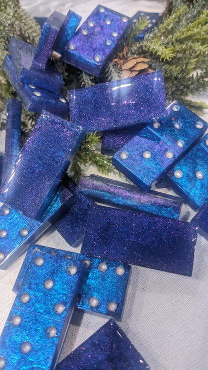 This is a set of handcrafted resin dominoes color changing blue and purple