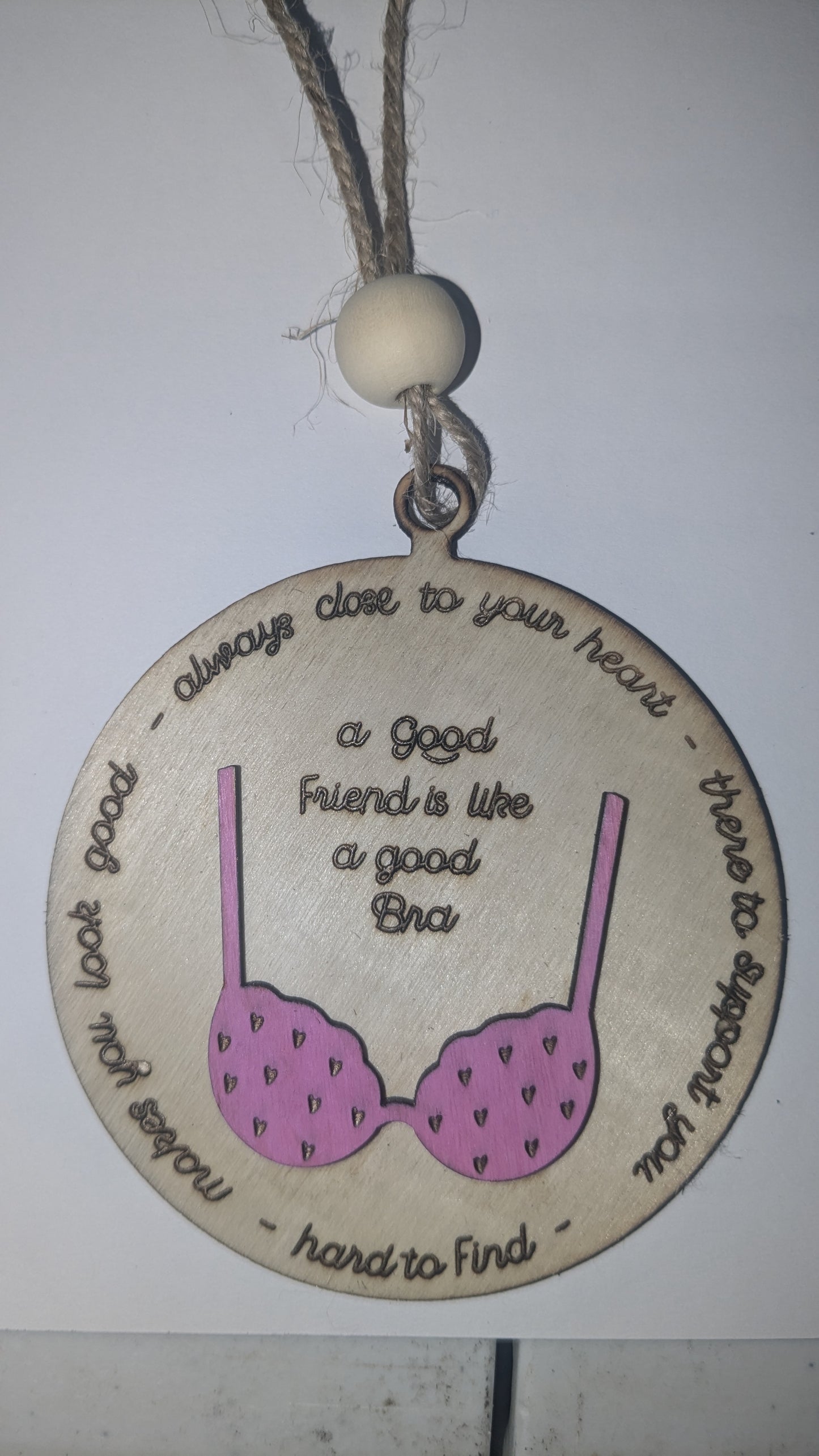 Ornament or car charm.  A good friend is like a good bra