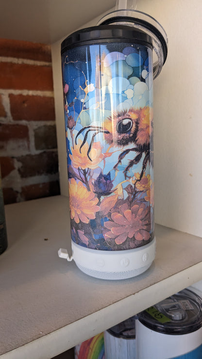 REDUCED PRICE 17 Oz Speaker Tumbler Colorful Bee. Has some fading of flowers beneath the bee