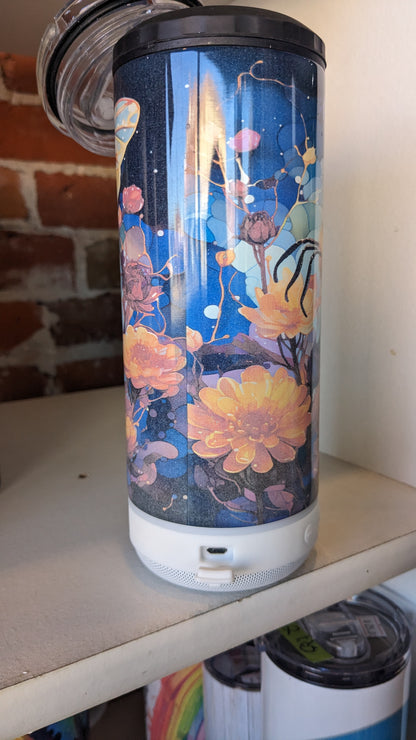 REDUCED PRICE 17 Oz Speaker Tumbler Colorful Bee. Has some fading of flowers beneath the bee