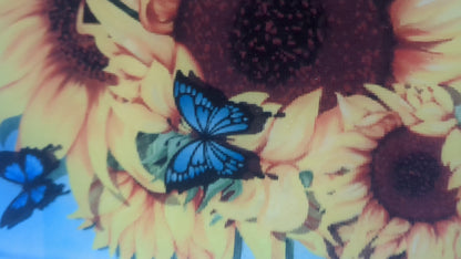 Glass cutting board with sunflowers and butterflies