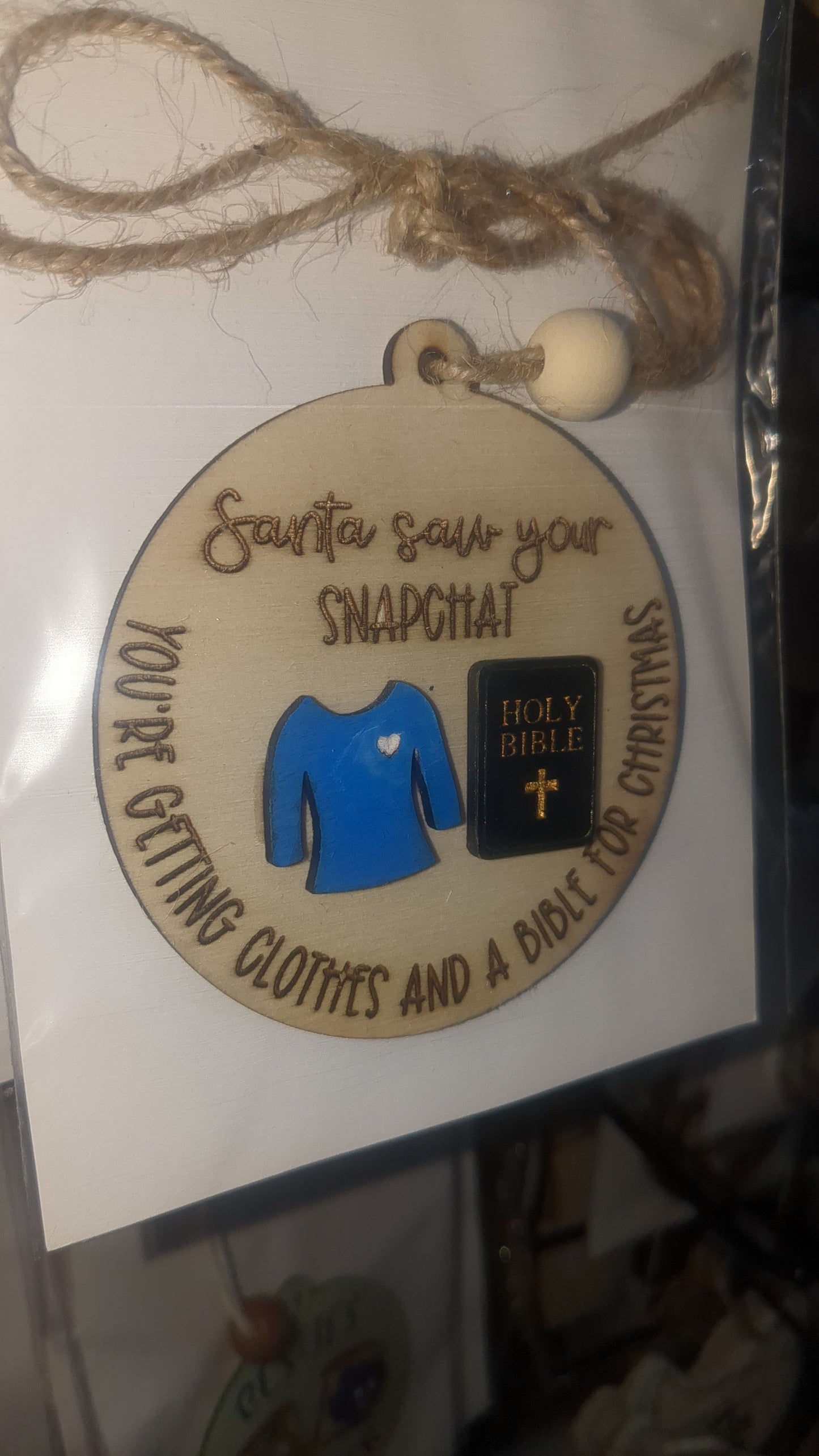 Ornament or car charm.  Santa saw your Snapchat