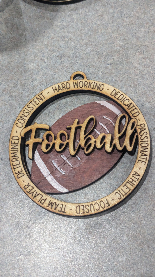 Wooden ornament or car charm.  Football