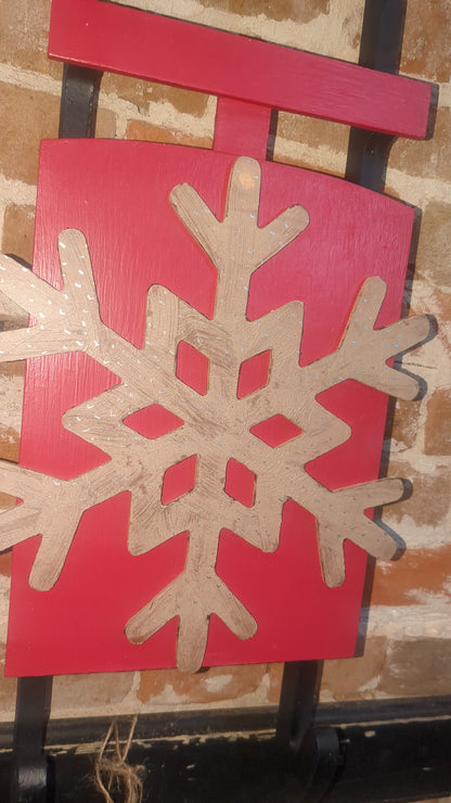 Red wooden sled with MDF snowflaked