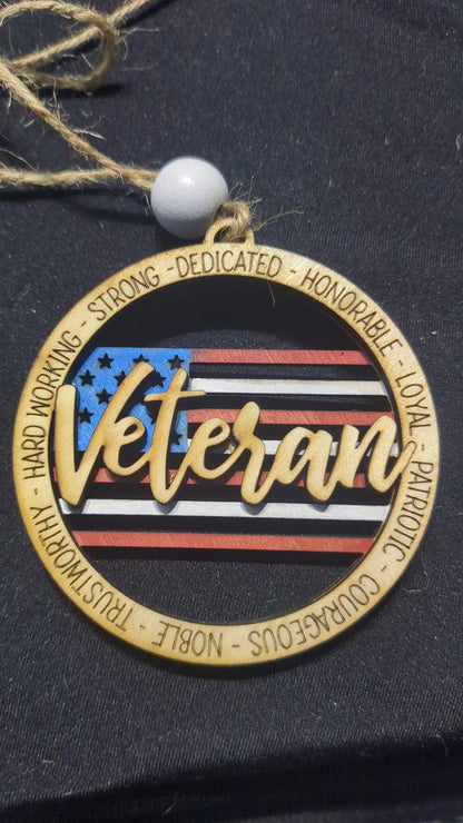 Wooden ornament or car charm.  Veteran