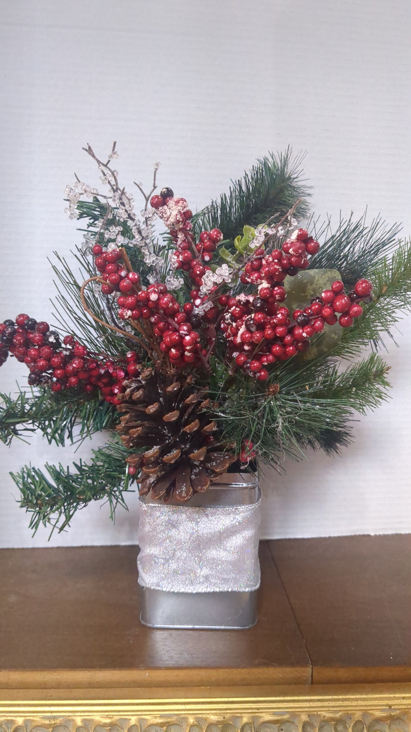 Christmas arrangement in silver tin