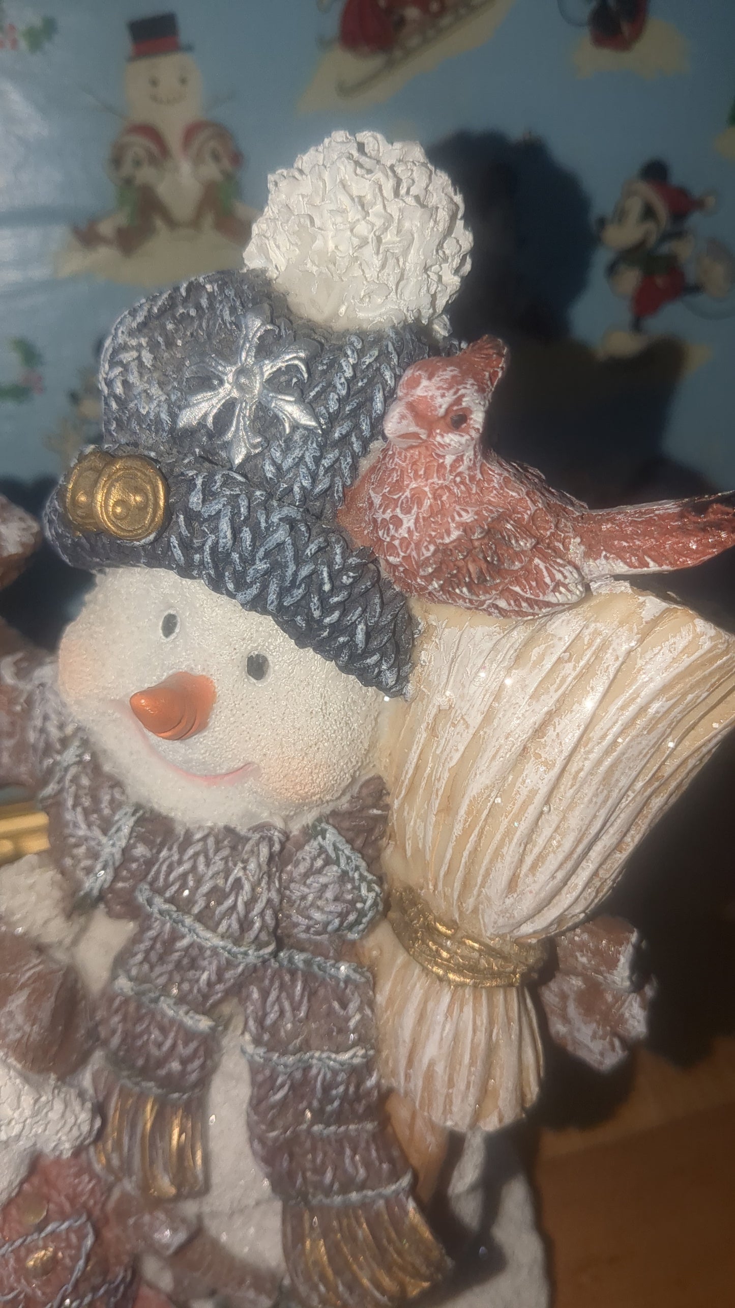 Snowman of three family with Cardinals