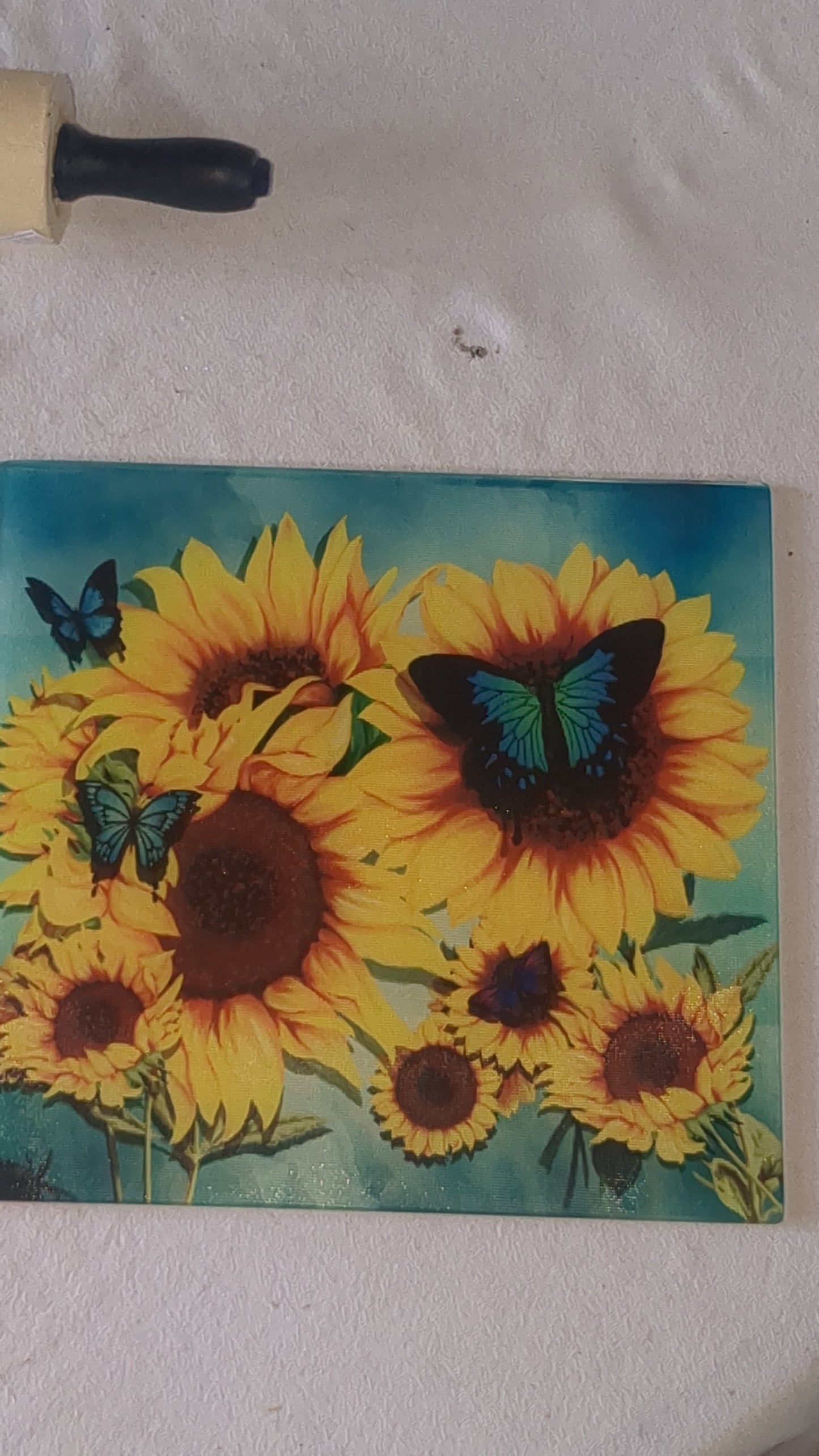 Glass cutting board with sunflowers and butterflies