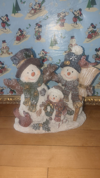 Snowman of three family with Cardinals