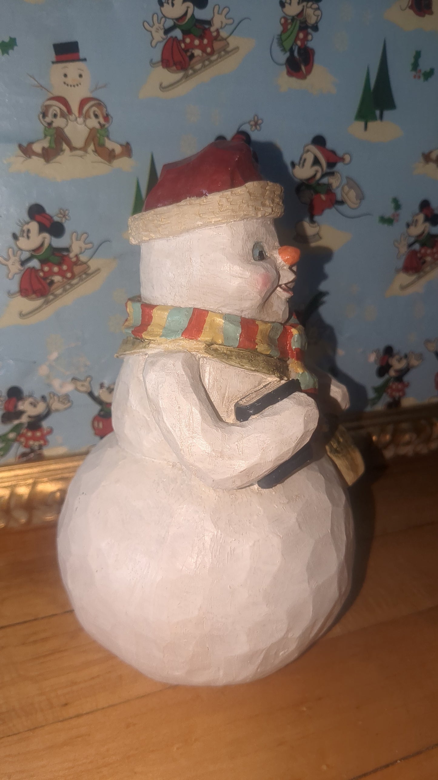 World Bazaars Polycrylic snowman.  Holding book and bag